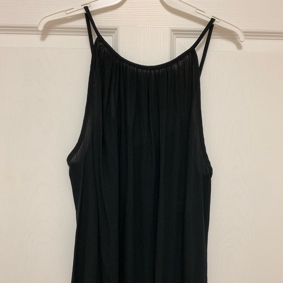 Tops - New. Black sleeveless boutique top